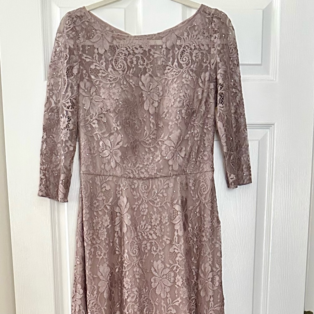 La Femme  Lace Quarter
Length Sleeve Bateau A-line
Dress size 6 Formal Gown - Picture 15 of 15